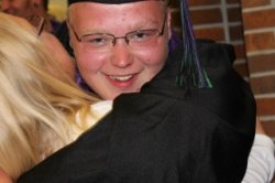 Cody hugging his mom at graduation 2012